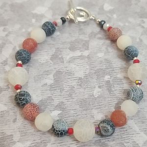 Red, white and blue beaded bracelet
